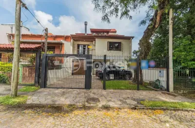 Casa com 3 quartos à venda na rua cassino, 75, ipanema, porto alegre, 379 m2 por r$ 980.000