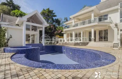 Casa em condomínio fechado com 4 quartos à venda na Avenida da Cavalhada, 5205, Cavalhada, Porto Alegre, 980 m2 por R$ 5.300.000