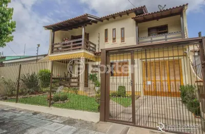 Casa com 4 quartos à venda na avenida josé corrêa da silva, 117, cavalhada, porto alegre, 318 m2 por r$ 800.000