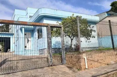 Casa com 5 quartos à venda na rua leão licurgo brasiliano arano, 125, vila nova, porto alegre, 312 m2 por r$ 850.000