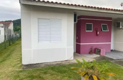 Casa geminada a venda de 02 dormitórios em condomínio fechado no bairro vale verde em palhoça-sc
