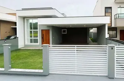 Casa nova de alto padrão com 3 quartos, área gourmet e pé-direito duplo em forquilhas - são josé/sc