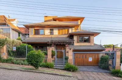 Casa com 4 quartos à venda na Rua Genny Zachia Stephanou, 43, Ipanema, Porto Alegre