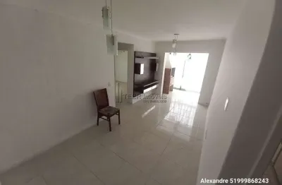 Apartamento padrão térreo 2 dormitórios com garagem e churrasqueira