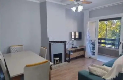 Apartamento padrão 2 dormitórios living com lareira sacada e garagem