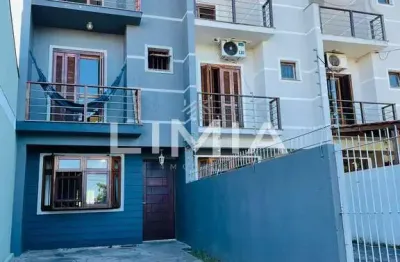 Casa com 3 quartos à venda na rua hugo nelson magalhães, 141, parque santa fé, porto alegre, 170 m2 por r$ 425.000