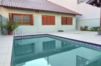 Casa com 5 quartos à venda na rua maestro salvador campanella, 46, jardim itu sabará, porto alegre, 372 m2 por r$ 1.499.990