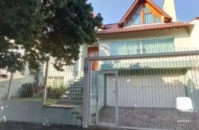 Casa com 5 quartos à venda na Rua Maestro Salvador Campanella, Jardim Itu Sabará, Porto Alegre, 372 m2 por R$ 1.498.000