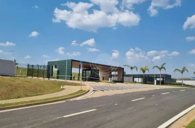 Terreno com pequeno aclive à venda no condomínio residencial vista campinas.