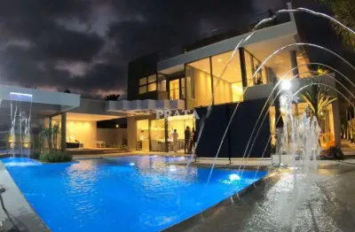 Riviera de s lourenço casa 7 suítes 8 vg de garagem alto padrão