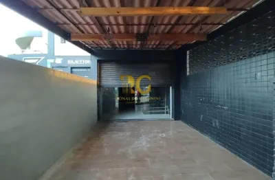 Salão comercial com mezanino no canto do forte, em praia grande.