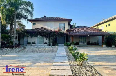Sobrado com 5 suítes à venda, 649 m² por r$ 2.500.000 - boungaiville - peruíbe/sp