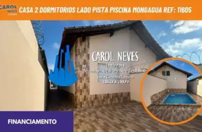 Casa 2 dormitorios lado pista piscina financiamento mongagua