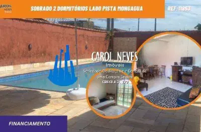 Sobrado 2 dormitorios piscina churrasqueira lado pista financia mongagua