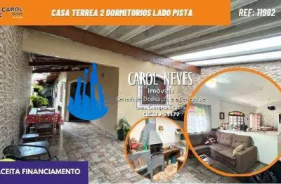 Casa terrea 2 dormitorios lado pista financiamento bancario mongagua
