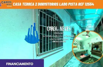 Casa terrea 2 dormitorios lado pista financiamento bancario mongagua