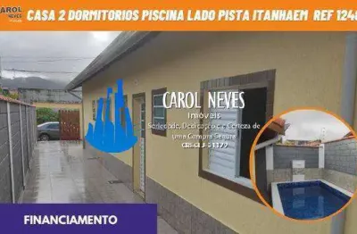 Casa 2 dormitorios 1 suite piscina lado pista financiamento itanhaem