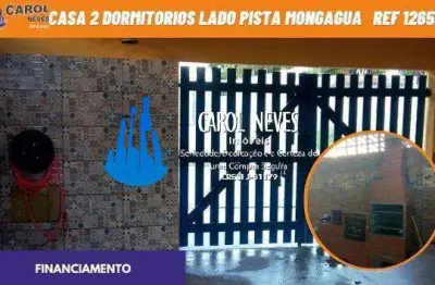 Casa 2 dormitorios churrasqueira lado pista financiamento mongagua