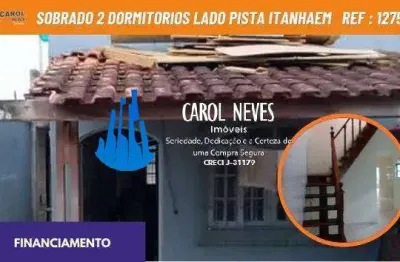 Sobrado 2 dormitorios varanda lado pista financiamento itanhaem