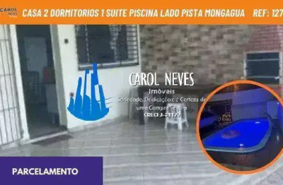 Casa 2 dormitorios 1 suite piscina lado pista parcelamento direto mongagua