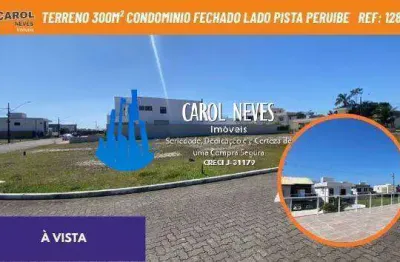 Terreno 300m² condominio fechado lado pista a vista peruibe