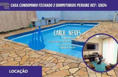 Casa condominio fechado locacao 2 dormitorios lado praia peruibe