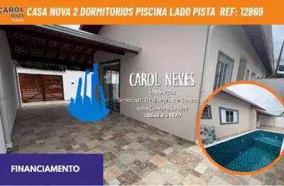 Casa nova 2 dormitorios piscina lado pista financiamento itanhaem
