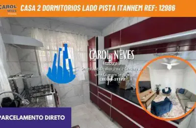 Casa 2 dormitorios lado pista parcelamento direto itanhaem