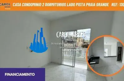 Casa condominio 2 dormitorios lado pista financiamento praia grande