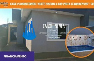 Casa 2 dormitorios 1 suite piscina lado pista financiamento itanhaem