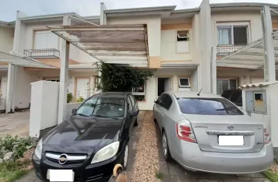 Casa em condomínio fechado com 3 quartos à venda na avenida armando fajardo, --, igara, canoas por r$ 689.000