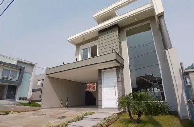 Casa em condomínio fechado com 3 quartos à venda na rua dos pinheiros, --, igara, canoas por r$ 1.945.000