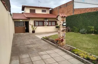 Casa com 4 quartos à venda na rua carazinho, --, mathias velho, canoas por r$ 635.000