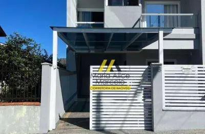 Sobrado geminado com 3 dormitórios à venda, 103 m² por r$ 549.000 - iririú - joinville/sc