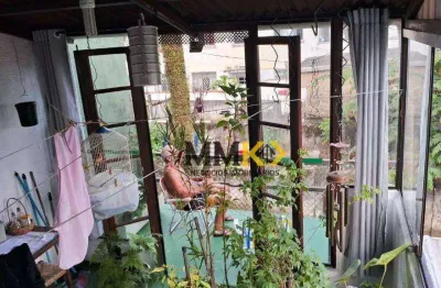 Casa com 5 quartos à venda no Macuco, Santos 