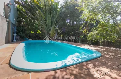 Casa em condomínio fechado com 3 quartos à venda na rua márcio dias, 196, nonoai, porto alegre, 214 m2 por r$ 850.000