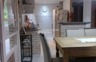 Casa em condomínio fechado com 3 quartos à venda na rua álamo, 96, são lucas, viamão, 250 m2 por r$ 789.900