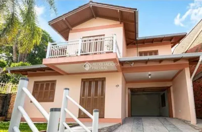 Casa com 4 quartos à venda na rua carlos c. grun, 79, rondônia, novo hamburgo, 249 m2 por r$ 499.900