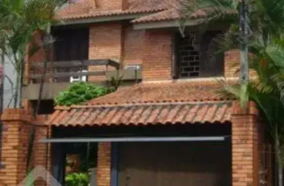 Casa em condomínio fechado com 4 quartos à venda na rua saudável, 60, medianeira, porto alegre, 240 m2 por r$ 901.000