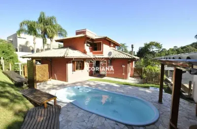 Casa em condomínio fechado com 3 quartos à venda na rodovia doutor antônio luiz moura gonzaga, 383, rio tavares, florianópolis por r$ 2.950.000