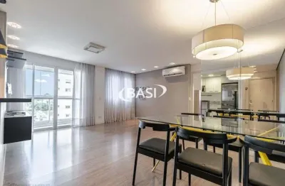 Apartamento semimobiliado com um dormitorio no cristo rei  e duas vagas de garagem !!!!