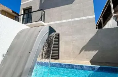 Casa com 2 suítes em condomínio com piscina no bairro do Macuco – Santos