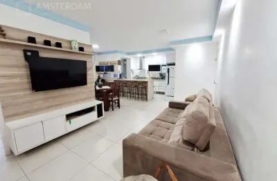 Prédio frente ao mar no centro de bertioga com 3 dormitórios, 1 suíte, 2 vagas de garagem cobertas, varanda gourmet