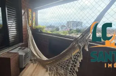 Apartamento de 2 dormitórios sendo 1 suíte com varanda e vaga de garagem .