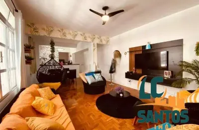 Apartamento com vista frontal para a praia do gonzaga em santos .