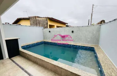 Casa nova com piscina e acabamento impecavel na praia de mongaguá