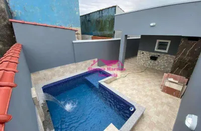 Casa nova com piscina com acabamento impecável na praia de mongaguá