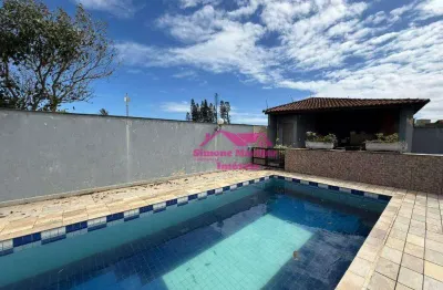 Sobrado em condominio com piscina lado praia á venda na praia de mongaguá