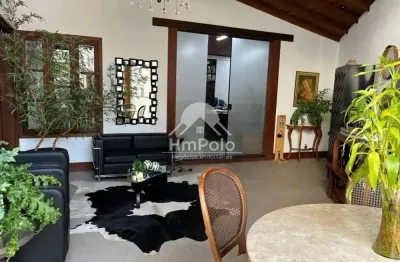 Casa comercial com amplas salas, 4 suítes e 5 vagas para locação no taquaral em campinas/sp.