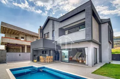 Casa com 4 dormitórios à venda, 400 m² por r$ 3.400.000,00 - condomínio residencial jaguary - são josé dos campos/sp